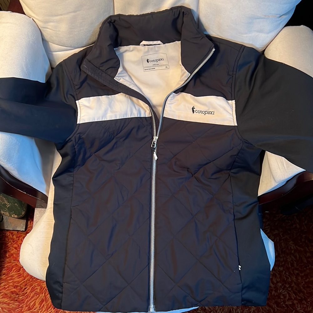 Women’s large Cotopaxi light weight jacket, never worn